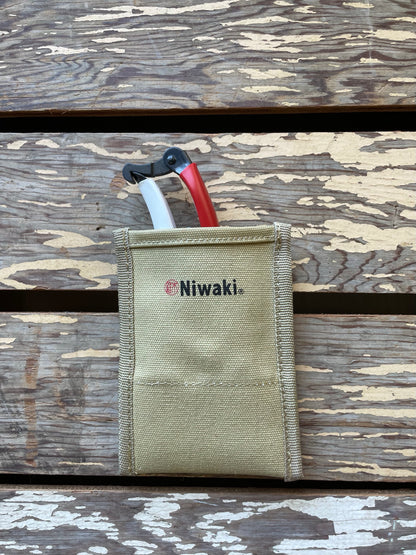 Niwaki Back Pocket Pouch holding Okatsune Secateurs