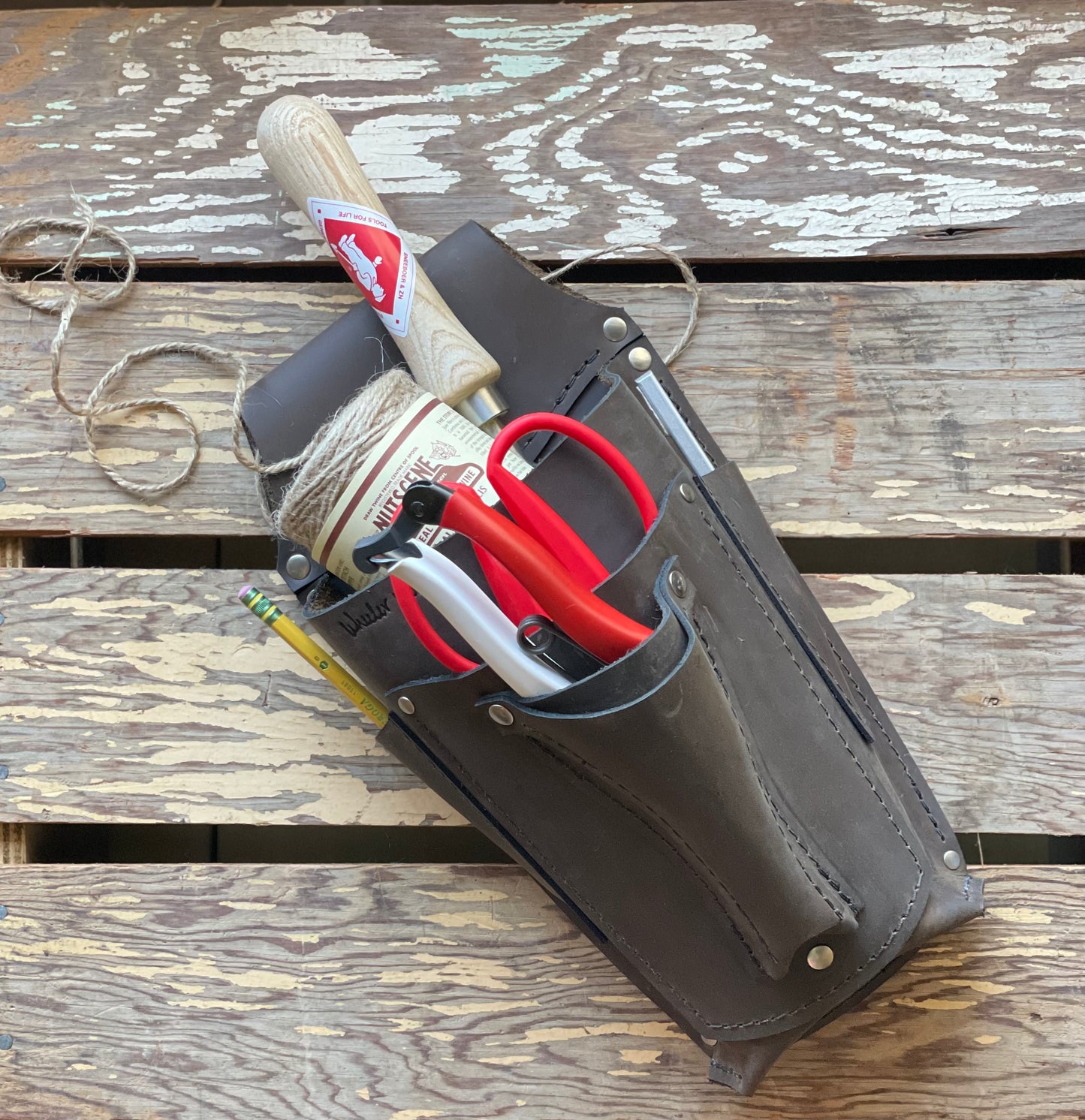 Leather Belt Bucket Holster filled with Gardener's Kit tools