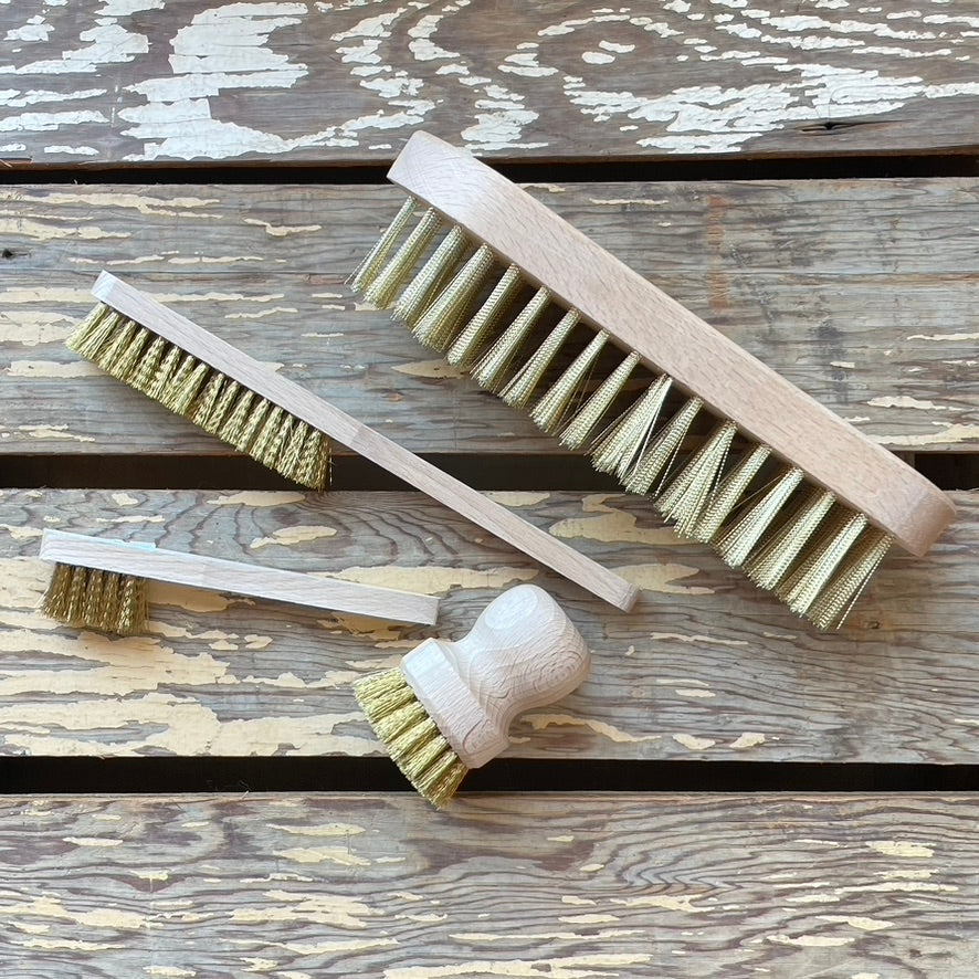 Display of Redecker Brass Wire Brushes for cleaning soil and dirt off digging and weeding tools