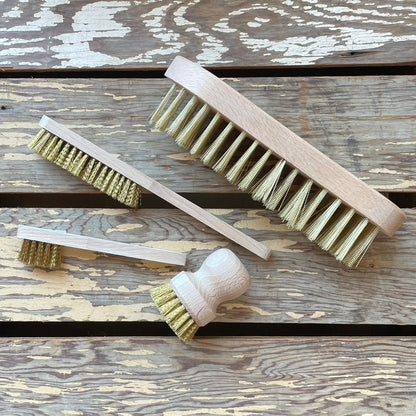 Display of Redecker Brass Wire Brushes for cleaning soil and dirt off digging and weeding tools