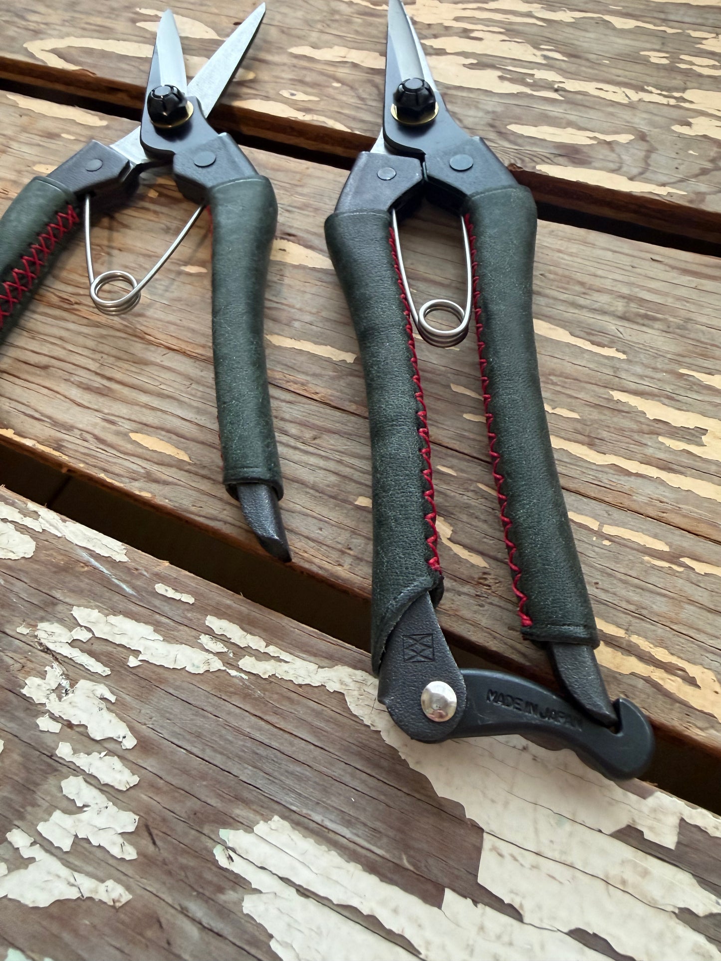Two pairs of Kuroco Leather Snips on display table