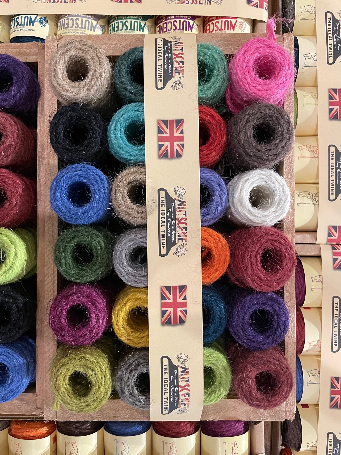 Overhead shot of Nutscene Mini Spools in Wooden Crate