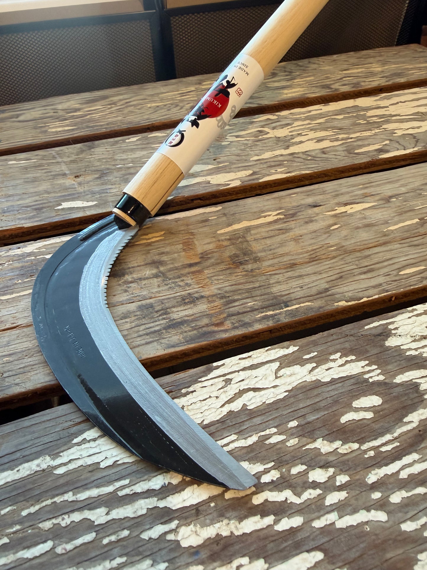 Close-up of Japanese Banshu Sawtooth Long Handle Sickle