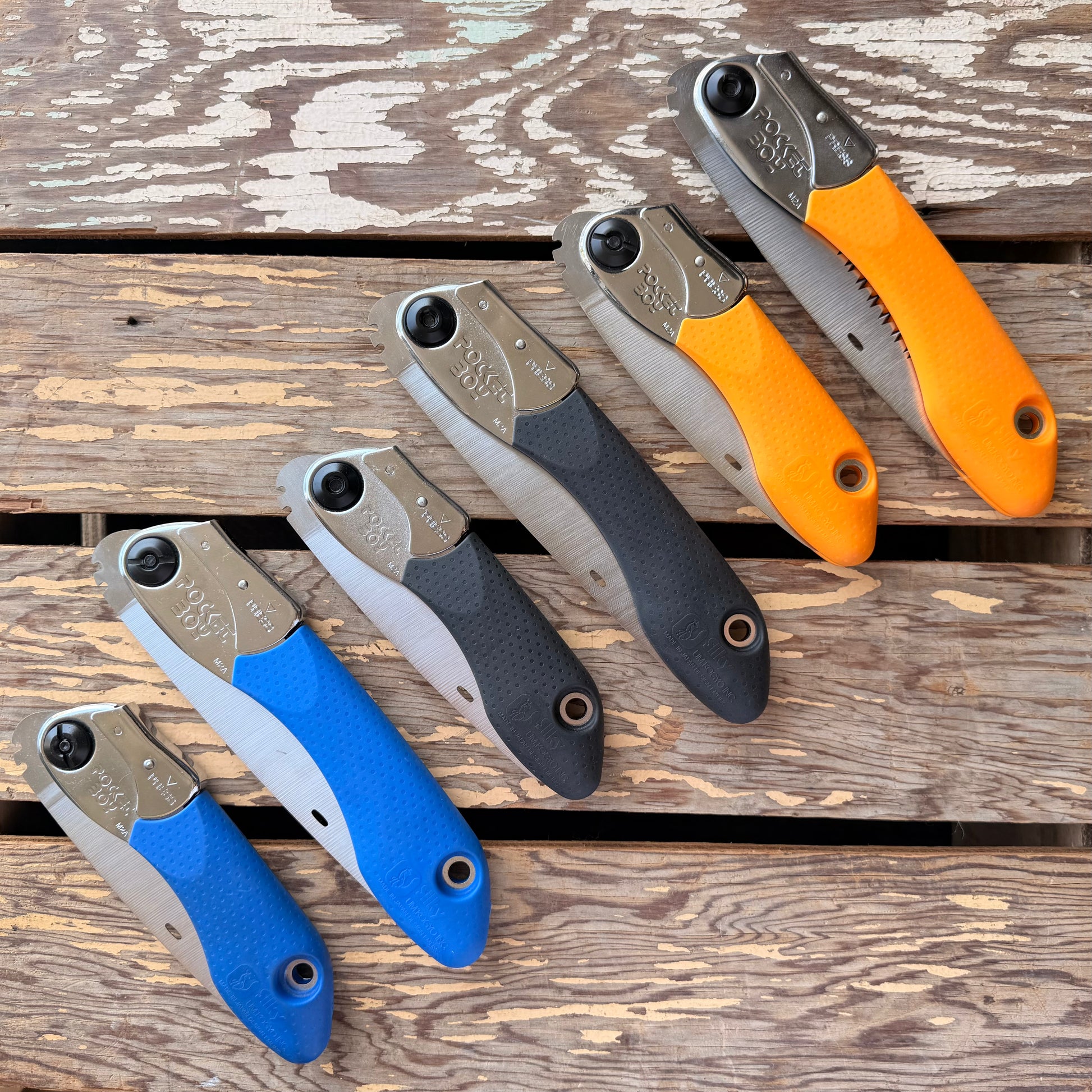 SIx Silky Pocketboy Hand Saws in closed position