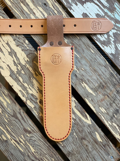 Tan leather Niwaki long holster with copper rivets, designed to hold long-bladed topiary clippers or a Hori Hori knife pictured with Niwaki Leather Belt